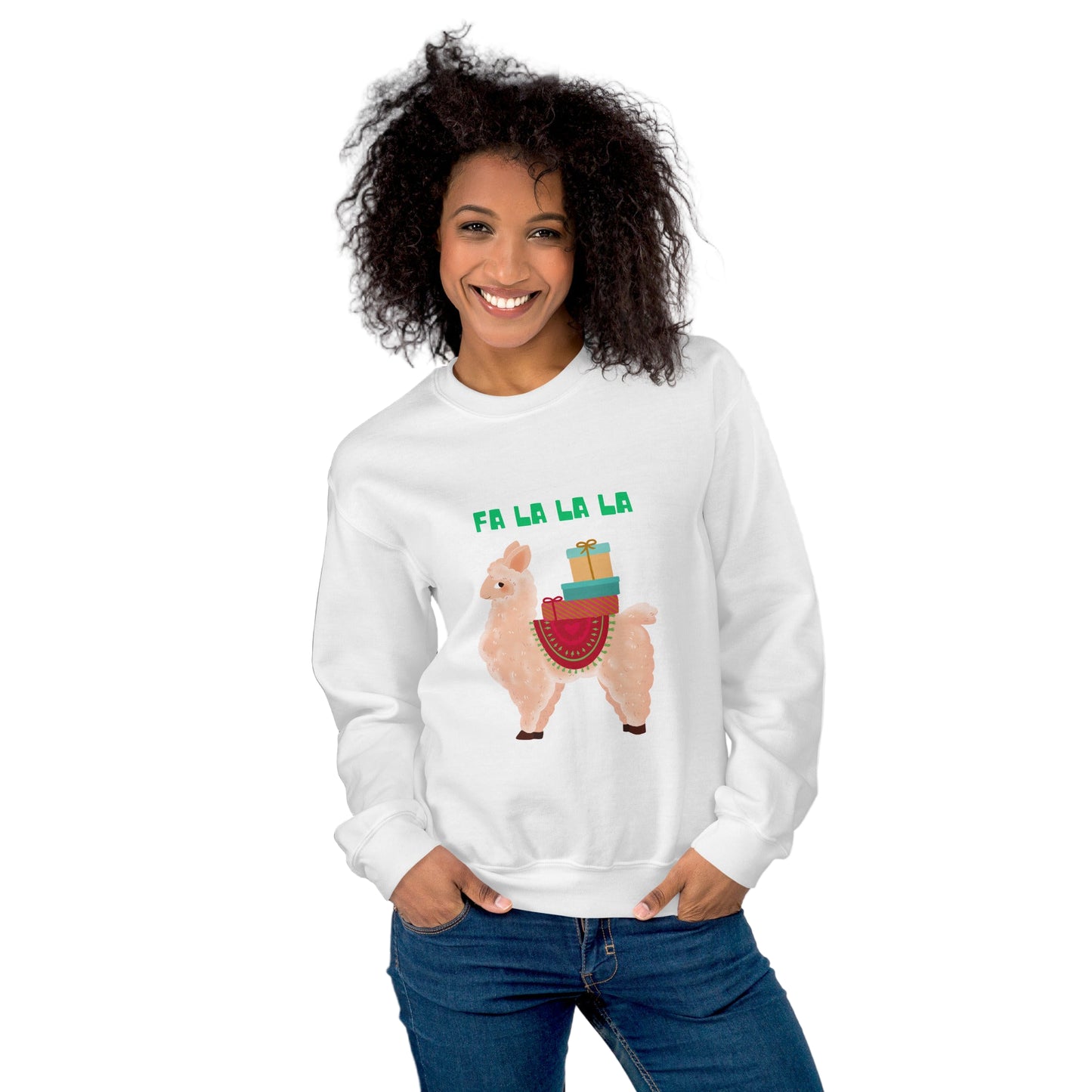 Woman wearing a white sweatshirt with a Christmas-themed design featuring a llama and presents, standing against a gray and white background.