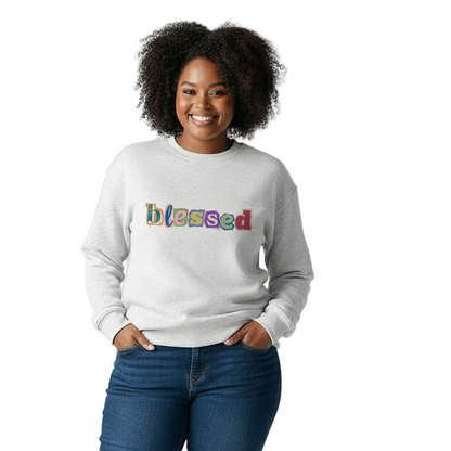 Person wearing a white sweatshirt with 'blessed' text and blue jeans on a white background