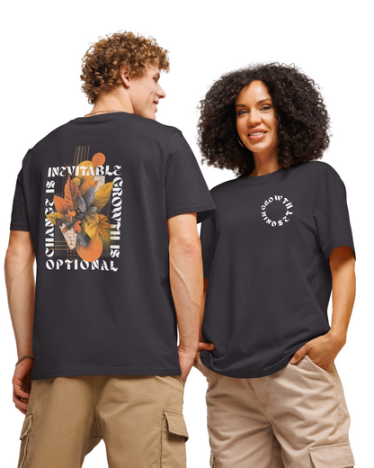 Two people wearing black t-shirts with printed designs on a plain background