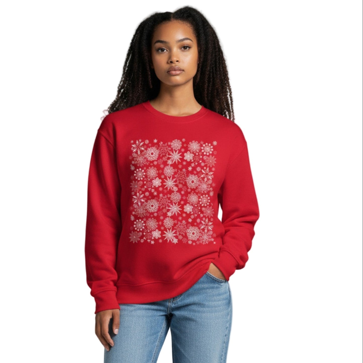 Person wearing a red sweater with a white pattern and light blue jeans on a gray background