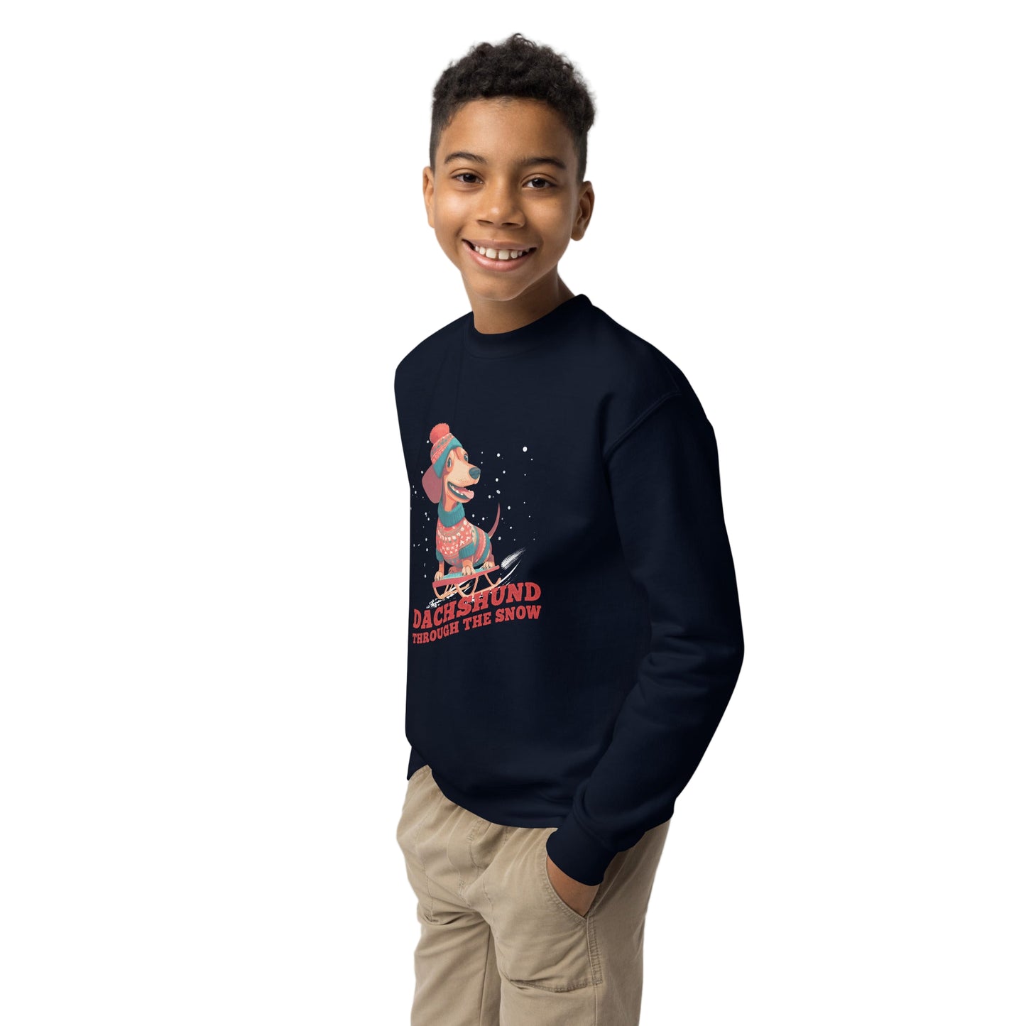 Child wearing a navy sweatshirt with a graphic design on a plain background